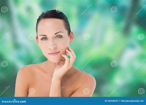 beautiful nude brunette posing with hand on face stock image image of