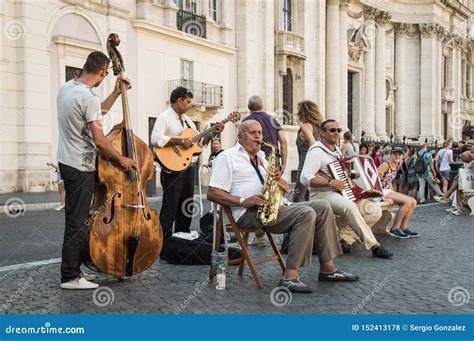 group  street musicians playing traditional   local town