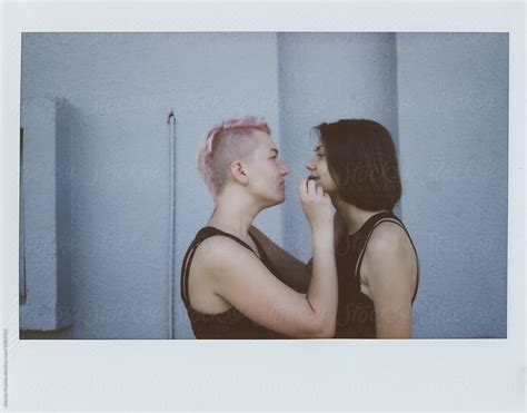 happy lesbian couple by alexey kuzma