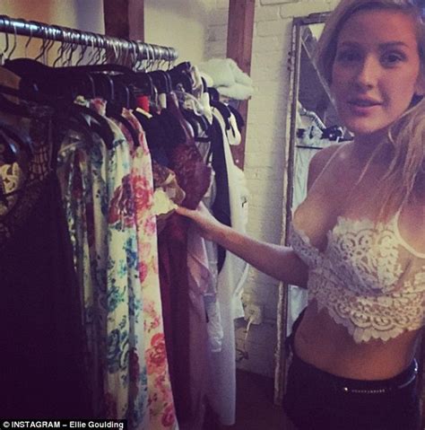 ellie goulding shows off her cleavage and toned tum as she