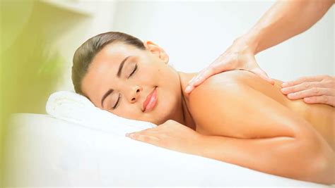 beautiful girl receiving body massage stock footage video