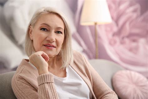 Beautiful Mature Woman On Sofa Space For Text Stock Image Image Of