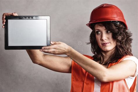 Girl In Safety Helmet Showing Tablet Stock Image Image Of Handyman