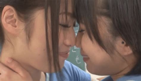 Two Japanese Girls Kissing