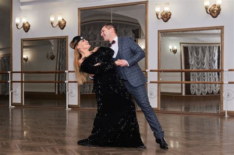 Premium Photo Man And Woman Amateur Dancers Laugh During Classical
