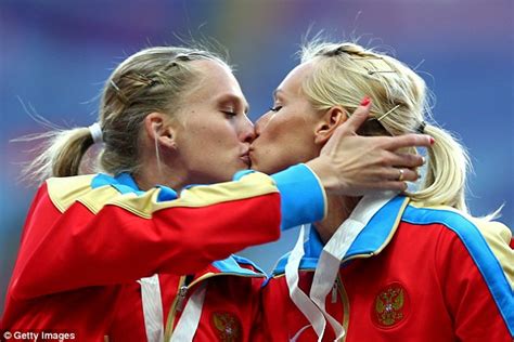 Female Russian Athletes Kissing After Relay Victory At World