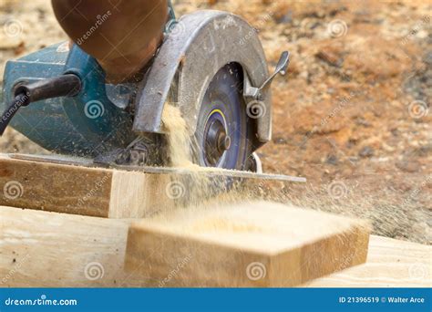 carpenter cutting wood royalty  stock images image