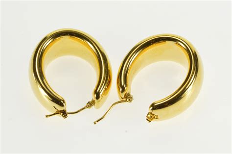 milor italy rounded puffy hoop yellow gold earrings property room