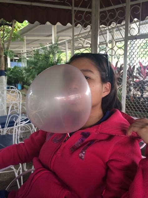 Girl Blowing A Huge Bubble With Pink Bubble Gum Blowing Bubble Gum