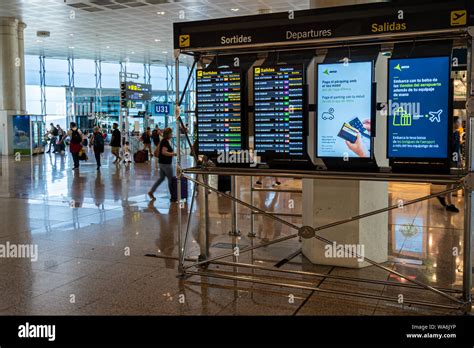 barcelona spain august  screens showing flight departures  terminal   barcelona