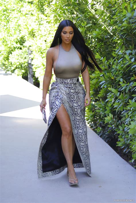 Kim Kardashian Braless And Pokies Photos