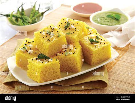 popular indian gujarati dish traditional street food sev khaman dhokla served  chutney