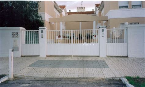 Puertas Abatibles – Lusan Puertas De Garaje