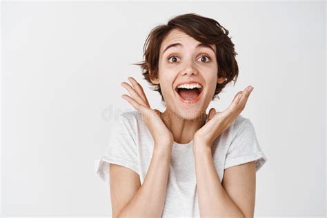 Close Up Of Surprised And Happy Woman Gasping Amazed Saying Wow