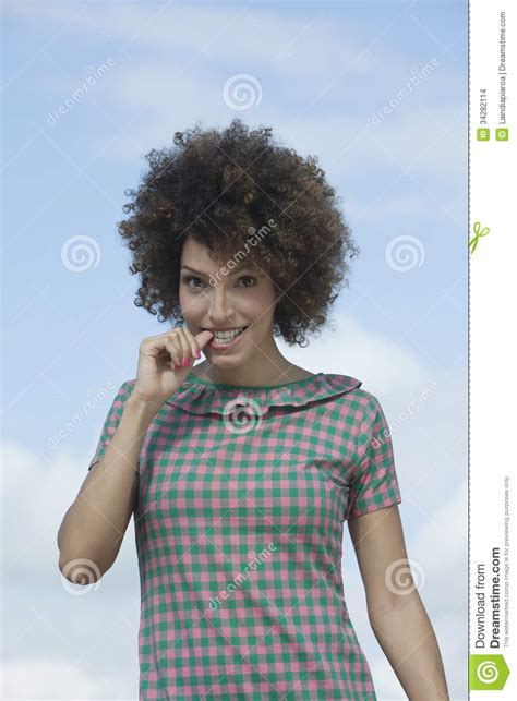 Embarrassed Woman Biting Thumbnail Stock Images Image 34282114