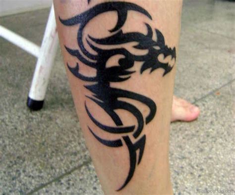 50 Nice Looking Dragon Tattoos For Leg Tattoo Designs –