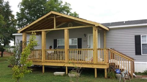 added roof  treated deck mobile home deck mobile home exteriors mobile home renovations