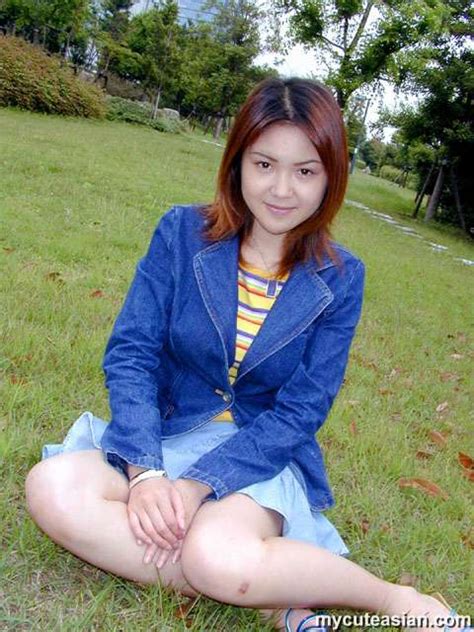 beautiful asian babe shows her cute ass and bushy cunt in the garden asian porn movies