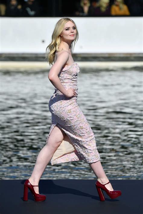 elle fanning walks  runway   loreal fashion show  paris