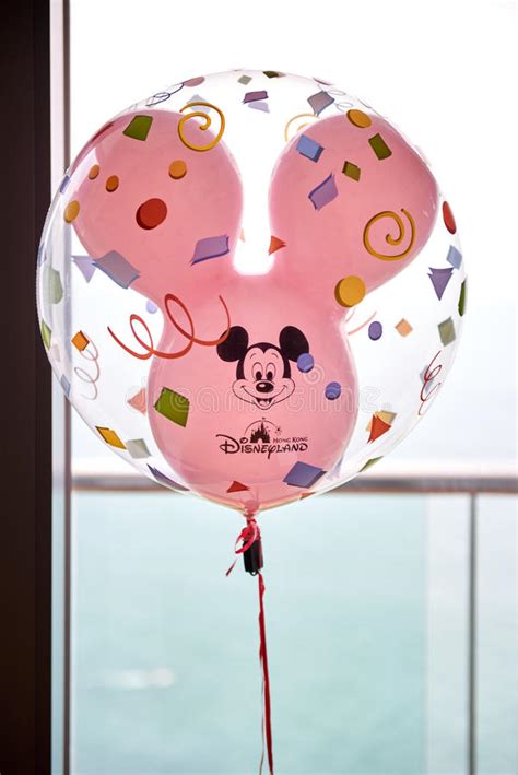 mickey balloon cart on disney parade editorial image