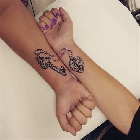unique couple tattoos    lovers   key tattoos