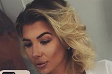 olivia love island flashes intimate piercing as she poses