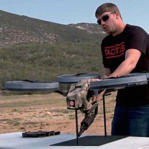 handgun attached drone trackimo