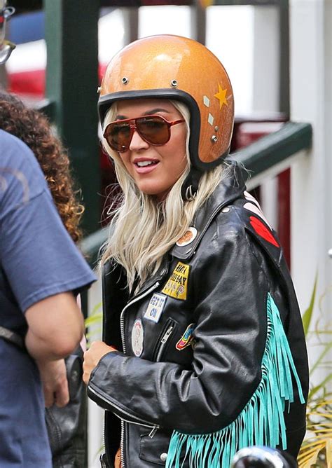katy perry revs up the sex appeal as she straddles harley davidson for