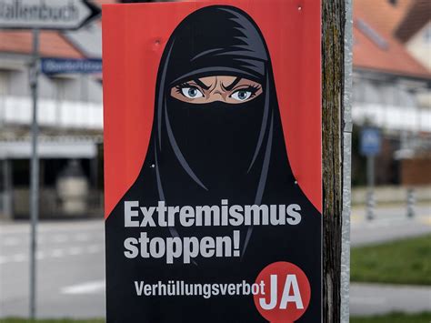 switzerland has voted to introduce a burqa ban to outlaw face