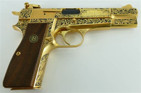 factory engraved cased gold plated browning  power mm pistol  rare collectible guns