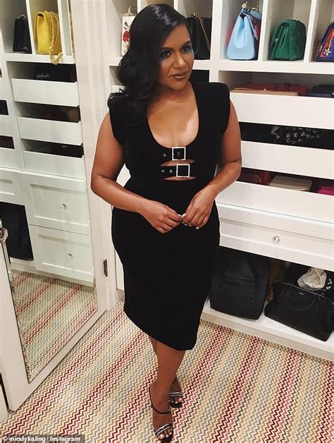 mindy kaling shows off a hint of cleavage in black dress as star rocks