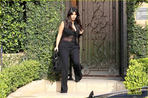 Kim Kardashian Pregnant In Sheer Top En Route To Airport Photo