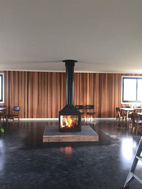 australias   sided wood heater seguin multivision  sided architecture  design
