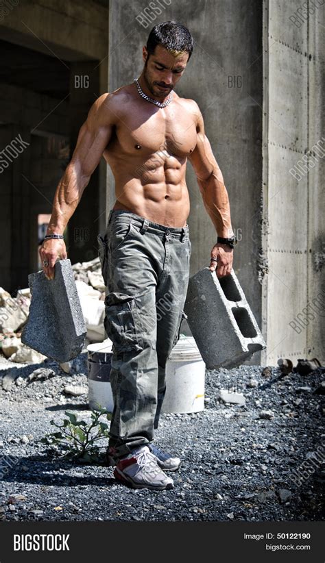 sexy construction worker shirtless with muscular body