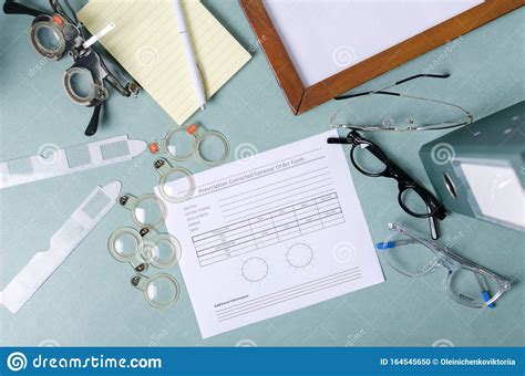Top View Of Doctors Of Optometry Workplace Eyeglasses