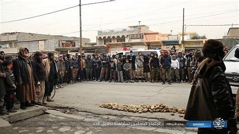 isis release images from public execution in mosul daily