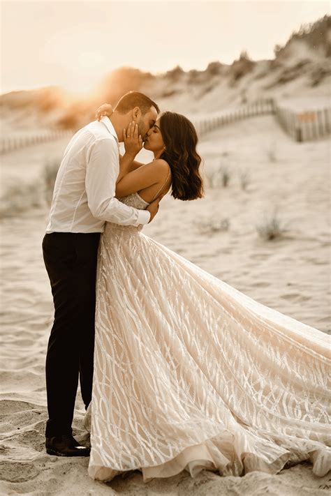 Bride And Groom Kissing At The Beach Wedding Photoshoot Beach