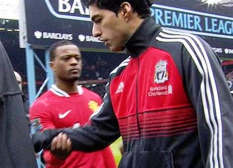 suarez apology  handshake snub