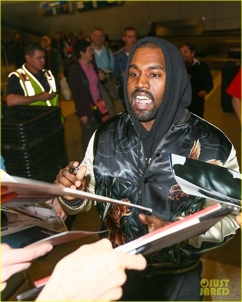 Kanye West Breaks Up Paparazzi Fight At Lax Airport Video Photo