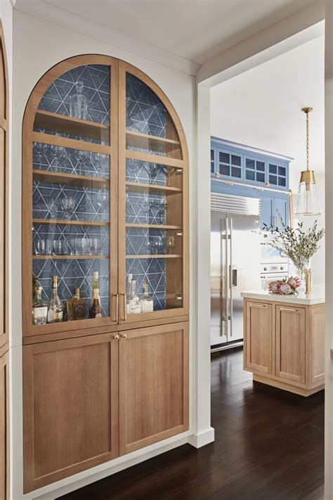 arched kitchen cabinet  blue tiles hgtv