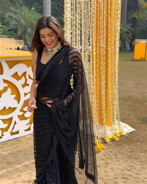 actress sushmita sen looking lovely in black saree stills saree