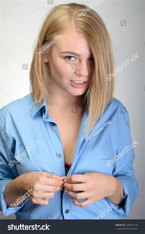 Woman Unbuttoning Her Blouse Tissino