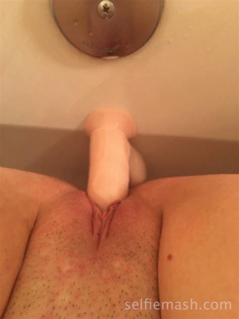wife pleasures her pussy with a suction dildo