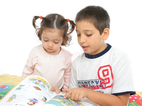 brother and sister reading a book on the floor stock image image of book couple 728357