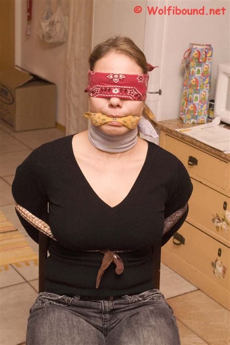 tied to a chair gagged and blindfolded with banda tumbex