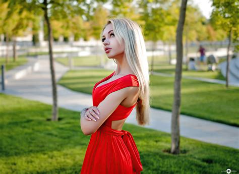 blonde girl red dress looking upward 4k hd girls 4k wallpapers