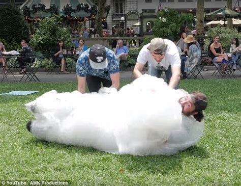 man gives free hugs while wrapped in a suit made of bubble wrap daily mail online