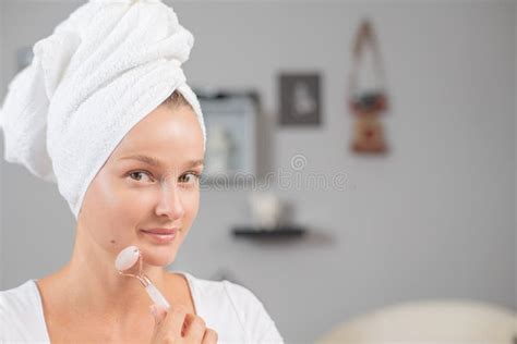 Face Massage Beautiful Woman Is Getting Massage Face Using Jade Facial