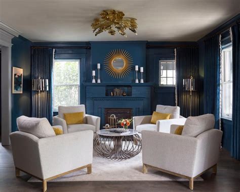 blue contemporary living room  sun mirror hgtv