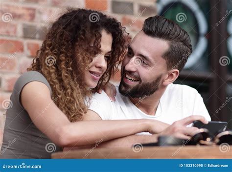 Beautiful Couple Having Coffee On A Date Having Fun Together Stock